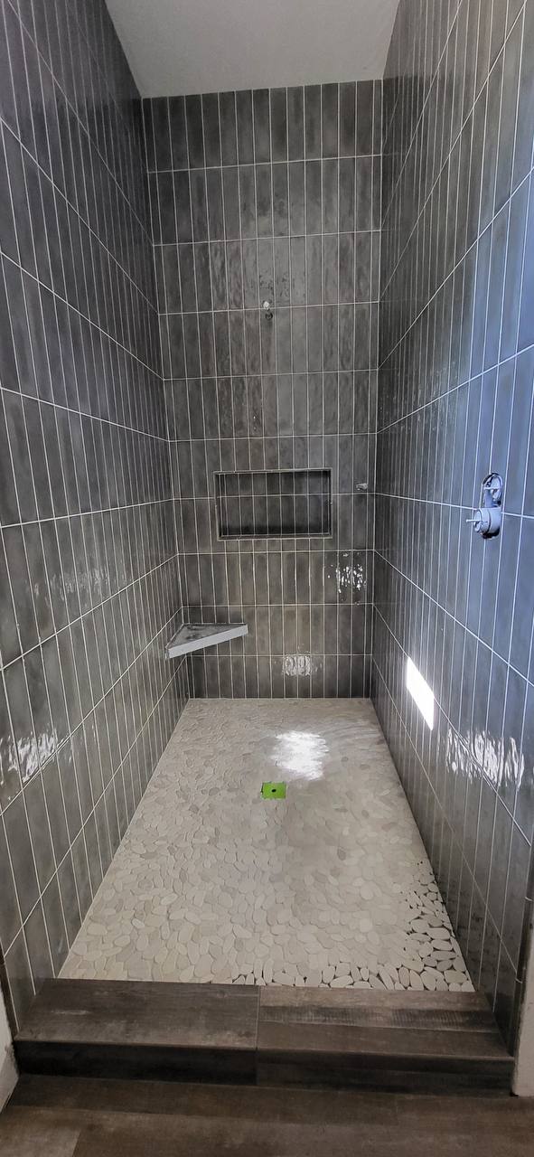 Pebble stone shower floor